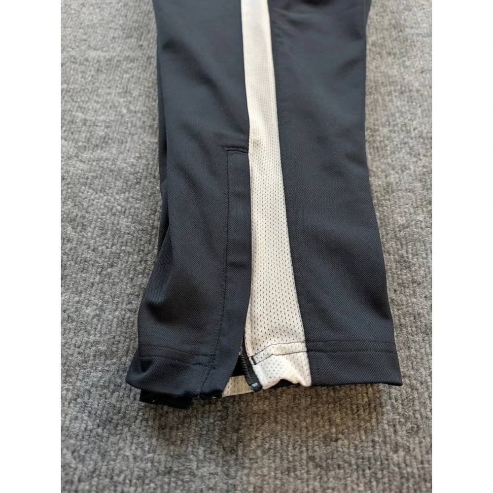 Under Armour Mens Track Pants Size 2XL Black White Stripe Ankle Zippers 1313201